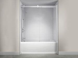 a newly installed bath and shower combo in previous shower stall space